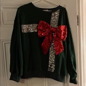 Festive Green Sweater with Red Bow